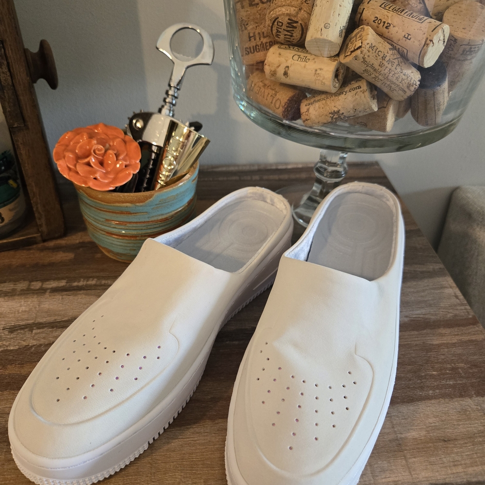 Nike White Slip-On Sneakers